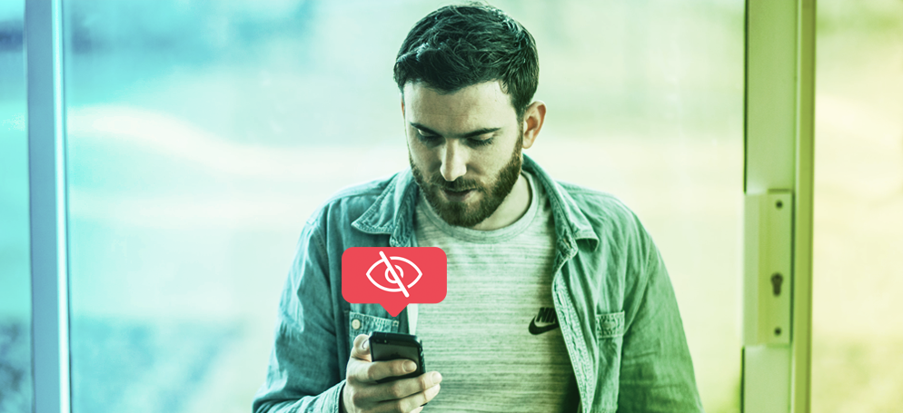 man looking at phone