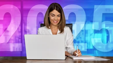 a woman taking notes at a desk