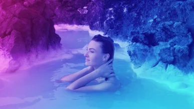 A woman bathing in the Blue Lagoon in Iceland