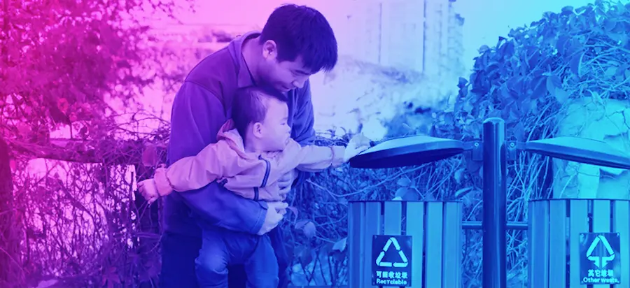 man with child in park