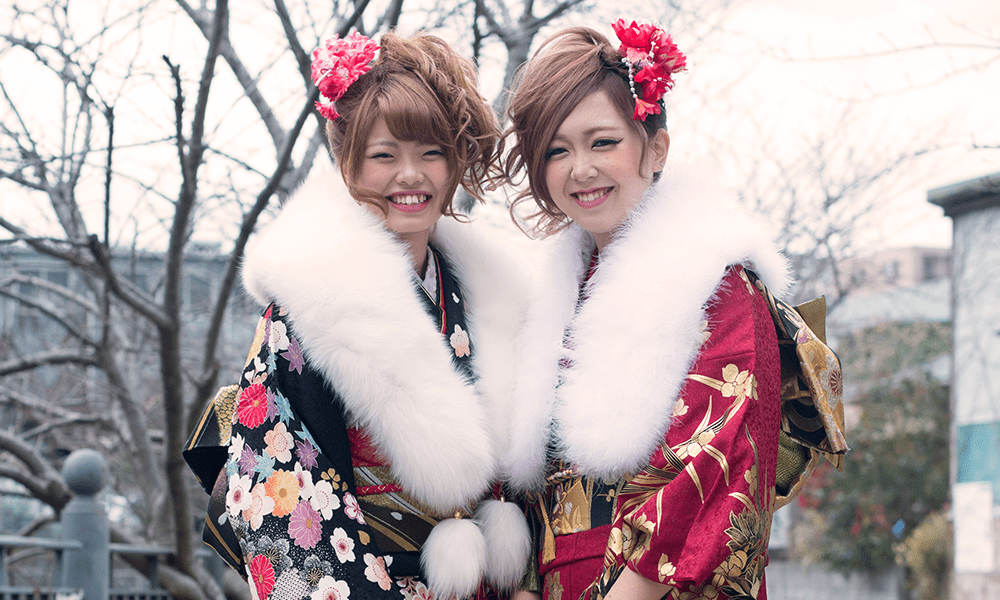2 women with large puffy coats
