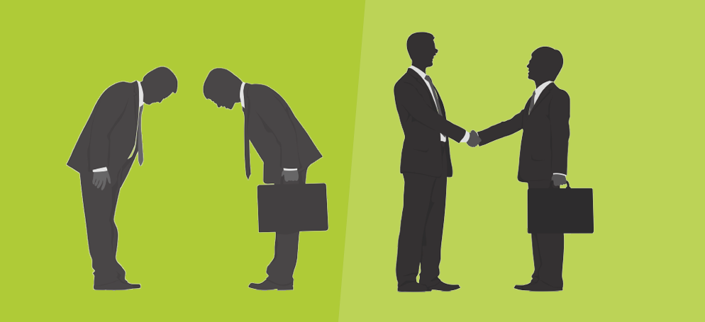 Two sets of businessmen - one set bowing to each other, the other set shaking hands