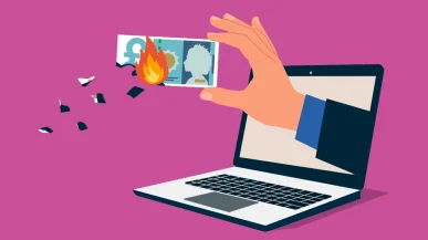 A cartoon hand holding a burning pound note through a laptop screen
