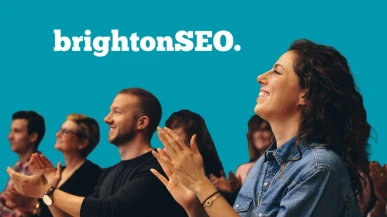 Audience applauding with BrightonSEO logo in the background